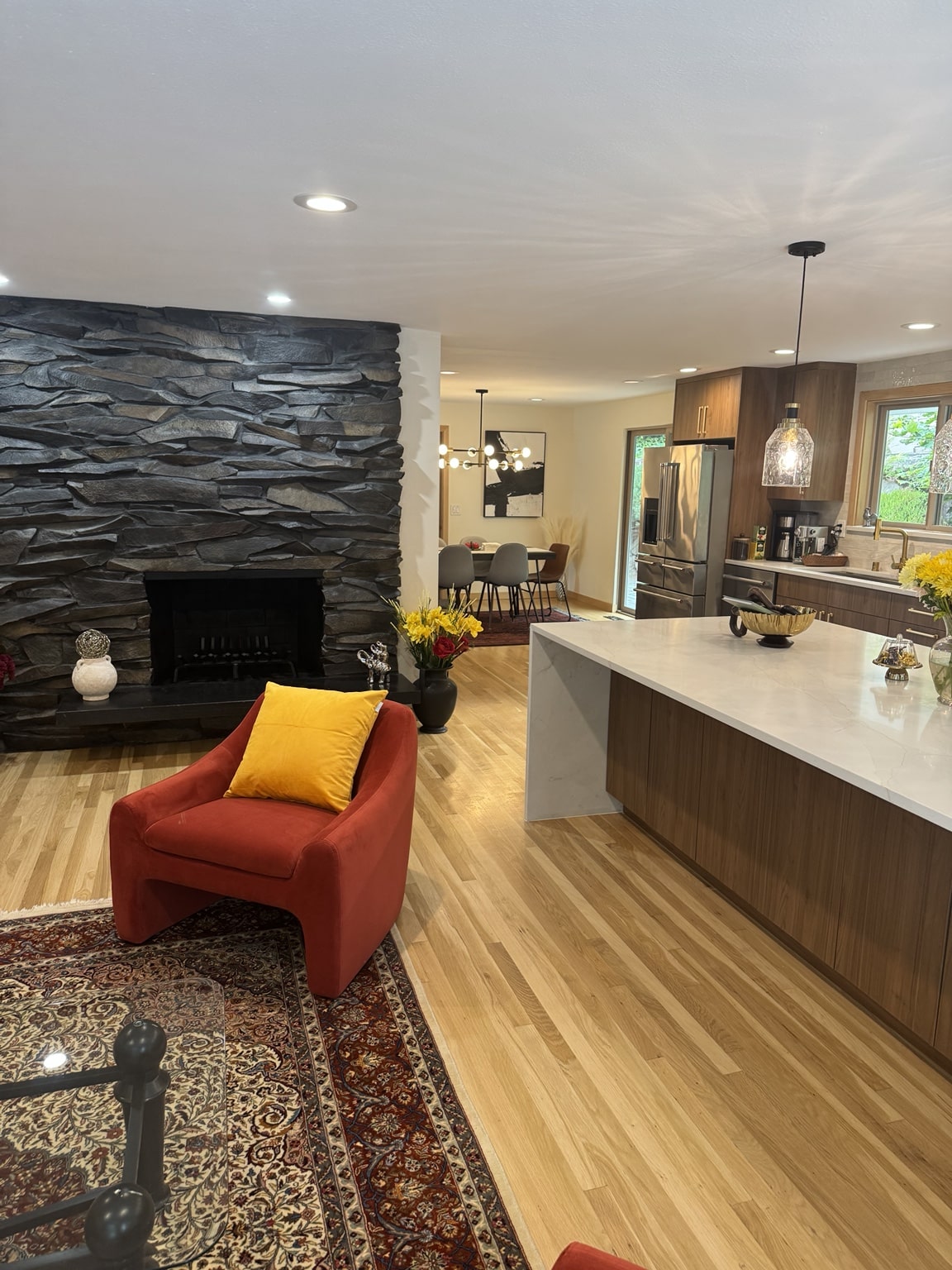 Kirkland kitchen opened to the living and dining areas after wall removal